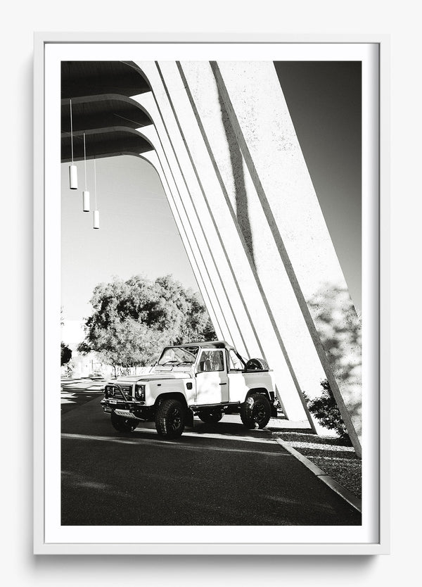 The Defender in a White frame