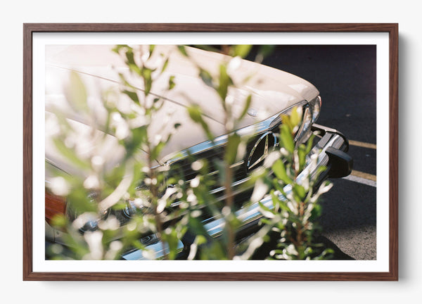 The Benz in a Heritage Walnut frame