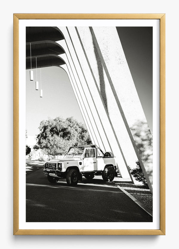 The Defender in a Gold frame