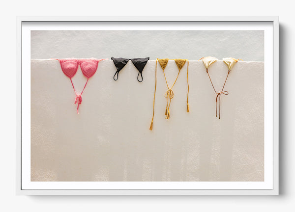 Bikini Hangs in a White frame