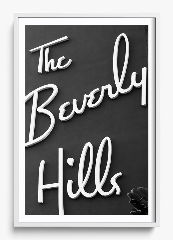 The Beverly Hills in a White frame