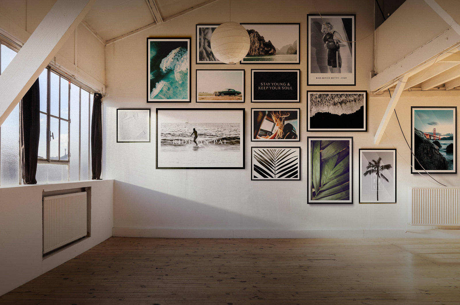 A Helm + Oar gallery wall of framed prints in a styled room scene
