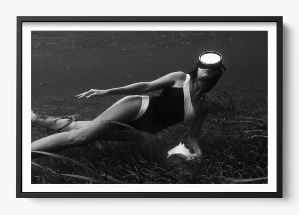 Her Searching in a Black frame