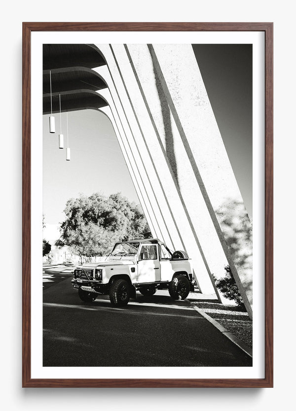 The Defender in a Heritage Walnut frame