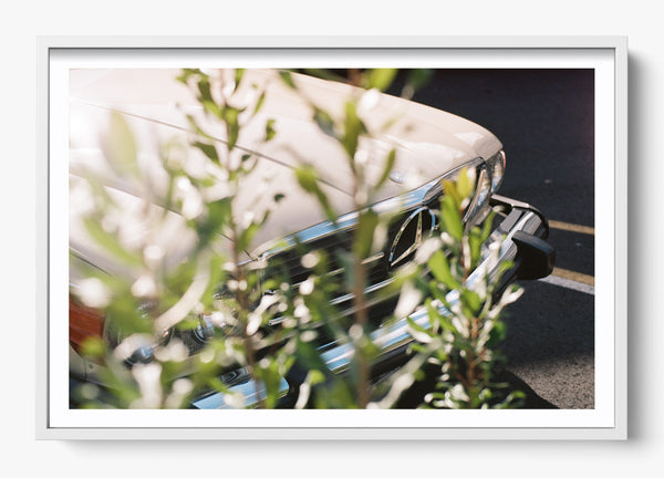 The Benz in a White frame