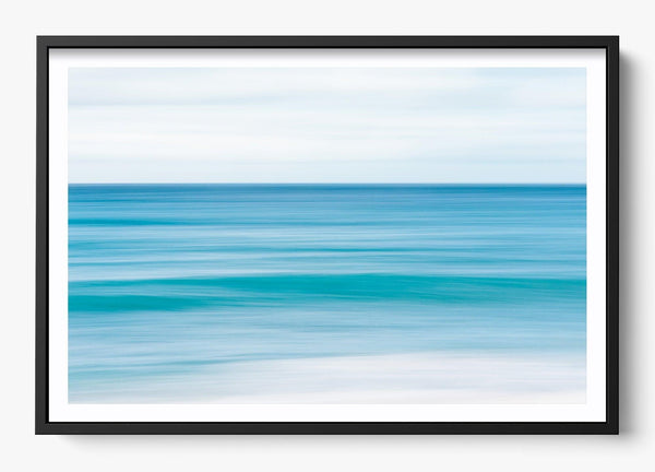 Tunnels Beach in a Black frame